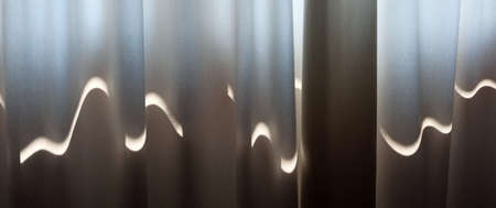 curtains in sunlightの写真素材