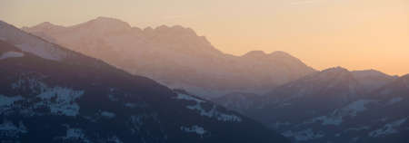 view of a mountain range in sunset light