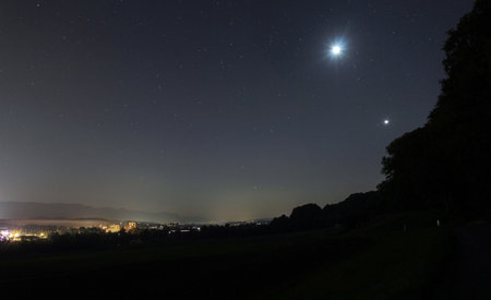 rural scenery with village lights at night