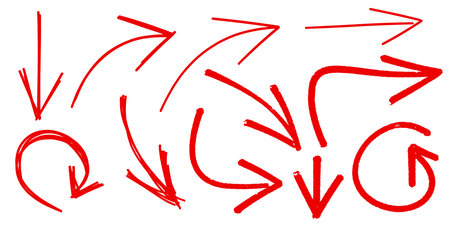 set of hand-drawn red arrow showing in various directions isolated on whiteの写真素材
