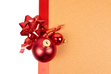 christmas decoration on copper orange glitter paper backgorund isolated on whiteの写真素材