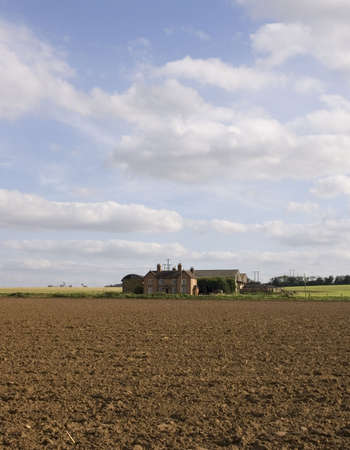 farmland earth  sky skies fallow ploughed fieldの写真素材