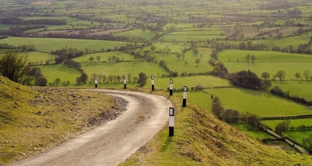 mountain road valley below long mynd shropshire england ukの写真素材