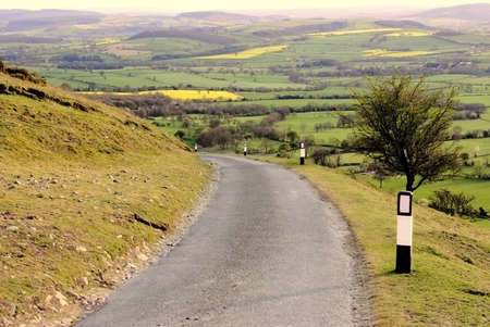 mountain road valley below long mynd shropshire england ukの写真素材