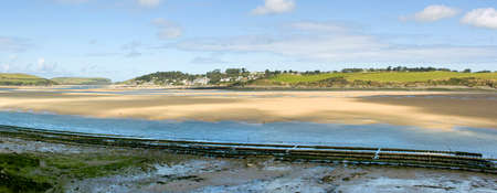 view from the camel trail cycleway and footpath along disused railway line the estuary of the river camel padstow and rock cornish coast cornwall england ukの写真素材
