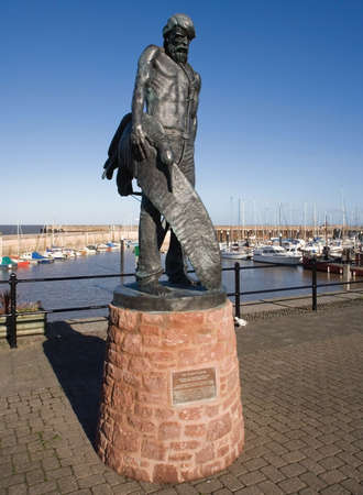 statue of ancient mariner watchet harbour somerset englandの写真素材