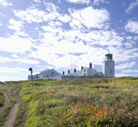 lighthouse lizard point the southernmost tip of land in england cornwall ukの写真素材