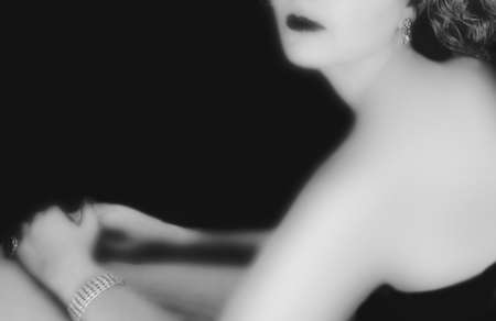 a woman photographed in the style of hollywood film noir