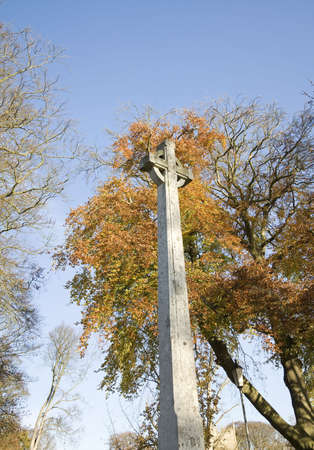A war memorial in a country churchyard.のeditorial素材