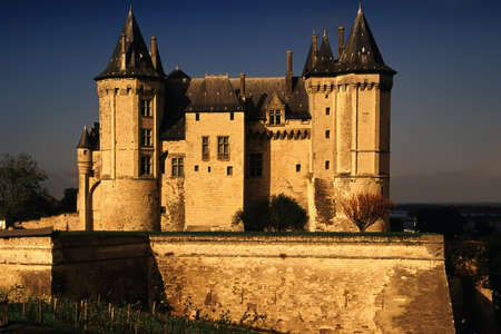 The chateau at saumur on the banks of the river loire.の写真素材