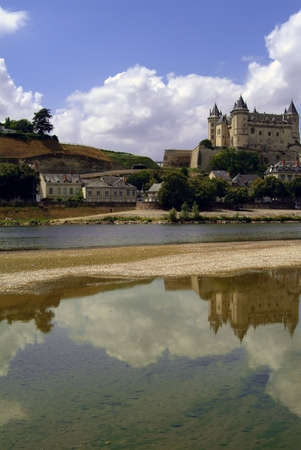The chateau at saumur on the banks of the river loire.の写真素材