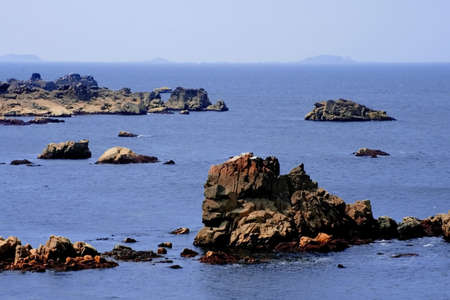 The rocky coast of the cote de granit rose, cotes d'armour, brittany.