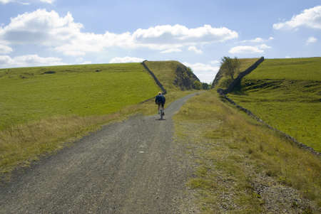 View from the tissington trail cycleway and footpath along disused railway line peak district national park derbyshire england uk.の写真素材