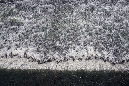 A fall of water, a mill race from a reservoir to a canal.の写真素材