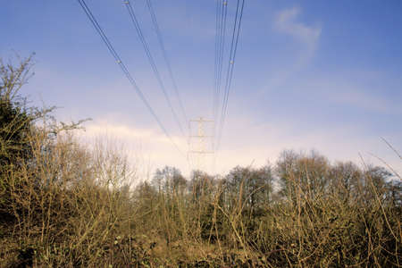 A metal pylon carrying electricity supply power lines.の写真素材