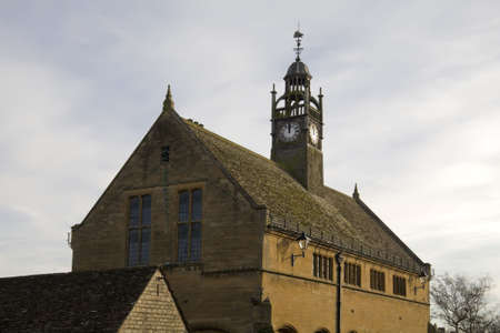 Clock tower on themarket hall moreton in the marsh high street cotswolds gloucestershire midlands...
