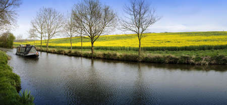 A narrow boat on the Stratford upon avon canal, Preston Bagot  Warwickshire, Midlands England UK.の写真素材
