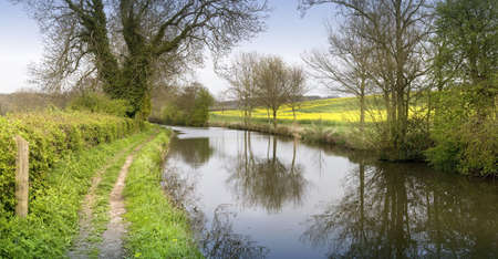 A towpath on the Stratford upon avon canal, Preston Bagot flight of locks, Warwickshire, Midlands England UK.の写真素材