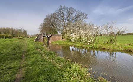 A bridge on the Stratford upon avon canal, Preston Bagot flight of locks, Warwickshire, Midlands England UK.の写真素材