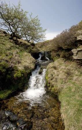 A waterfall gridsbrook view from the pennine way long distance footpath edale the high peak district national park derbyshire midlands ukの写真素材