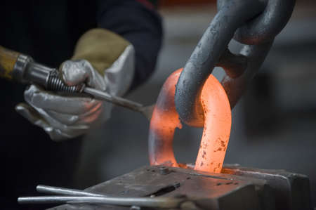 Inside a factory making manufactured goods with steel.の写真素材
