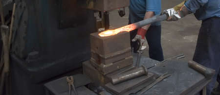 Inside a factory making manufactured goods with steel.