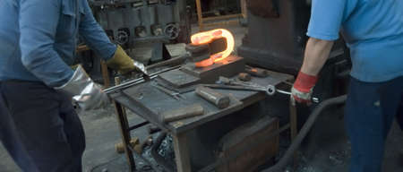 Inside a factory making manufactured goods with steel.
