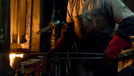 Inside a factory making manufactured goods with steel.の写真素材