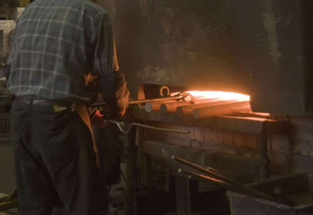 Inside a factory making manufactured goods with steel.の写真素材