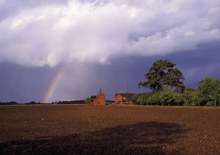 Rainbow Farmland Farmhouse Warwickshire Midlands Englandの写真素材