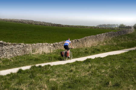 view from the high peak trail cycleway and footpath along disused railway line peak district national park derbyshire england ukの写真素材
