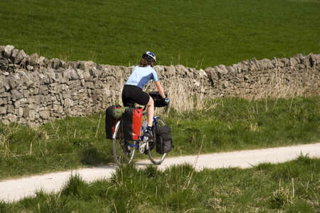 view from the high peak trail cycleway and footpath along disused railway line peak district national park derbyshire england ukの写真素材