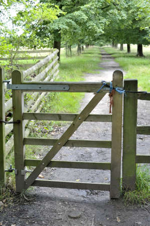 A gate on a footpath.の写真素材