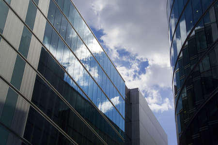 england london the city office block near to london assembly building on the banks of the river thamesの写真素材