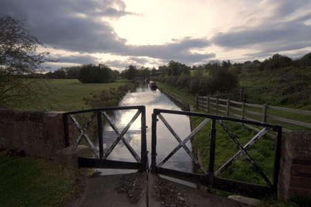 A narrow boat on the Stratford upon avon canal, Preston Bagot flight of locks, Warwickshire, Midlands England UK.の写真素材