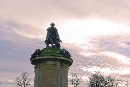 Statue of  William Shakespeare behind Stratford upon Avon Warwickshire England United Kingdom Europeの写真素材