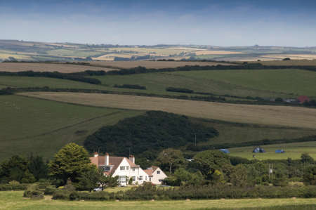view over devon countryside with fields and farmlandの写真素材