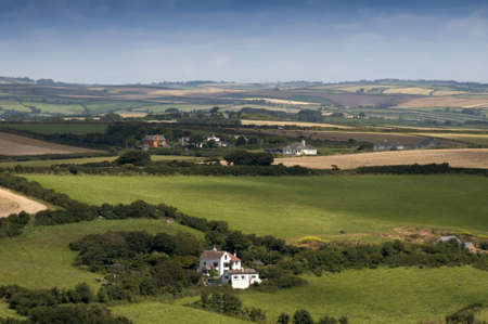 view over devon countryside with fields and farmlandの写真素材