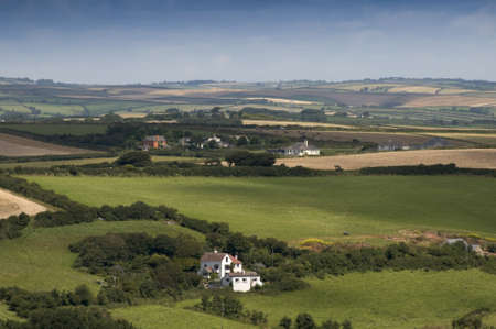 view over devon countryside with fields and farmlandの写真素材