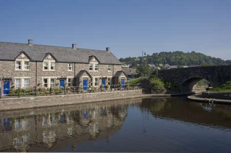 houses alongside the monmouthshire and brecon canal brecon powys wales uk