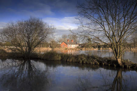 Houses next to canal or river.の写真素材