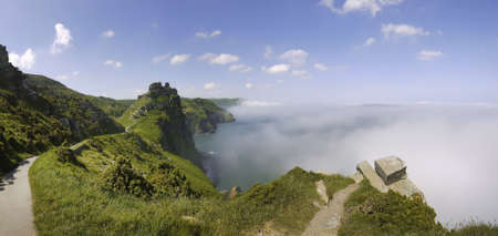 the coast of the valley of the rocks lynton devon with sea fog against the cliffsの写真素材