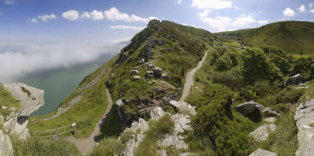 the coast of the valley of the rocks lynton devon with sea fog against the cliffsの写真素材
