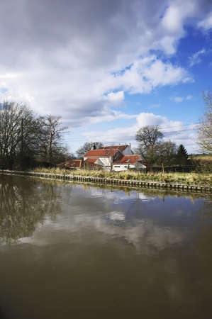Houses next to canal or river.の写真素材