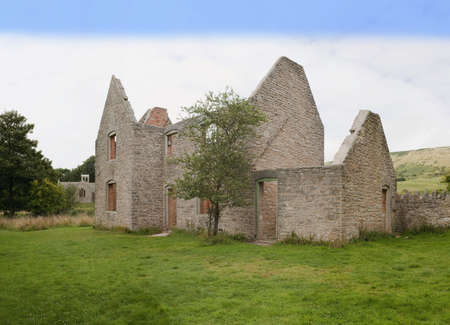 the abandoned village of tyneham on army land in dorset. village was taken over by the army in the second world war & is now deserted.の写真素材