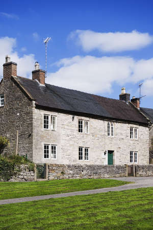 village with houses in countryside - tissington, derbyshire, peak district, national park, england, ukの写真素材