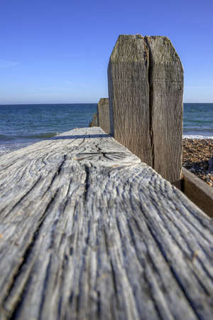 a shingle beach with groynes, near littlehampton, west sussex, england, ukの写真素材