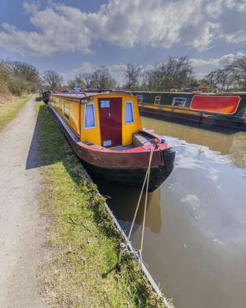 a canal on the inland waterways network of navigable canals and waterways in the english and british countryside in the uk, united kingdom, great britain, europeの写真素材