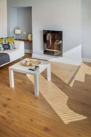 lounge area in newly restored rebuilt house の写真素材