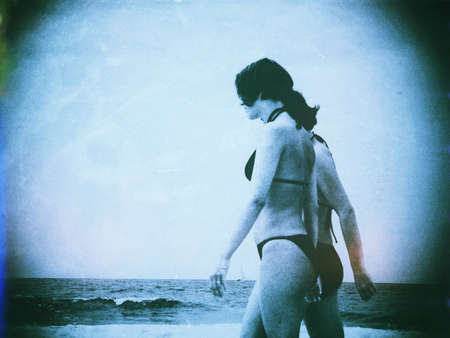 Girls on beach in style of 1950の素材